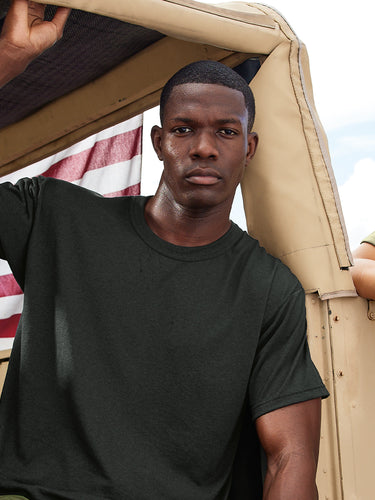 man and woman leaning on jeep wearing soffe military tees