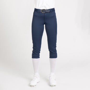 Front angle Model shot of female in Intensity Girls Softball Knit Pant in color NAVY
